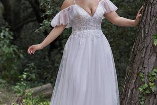 vestido de novia con holán en mangas