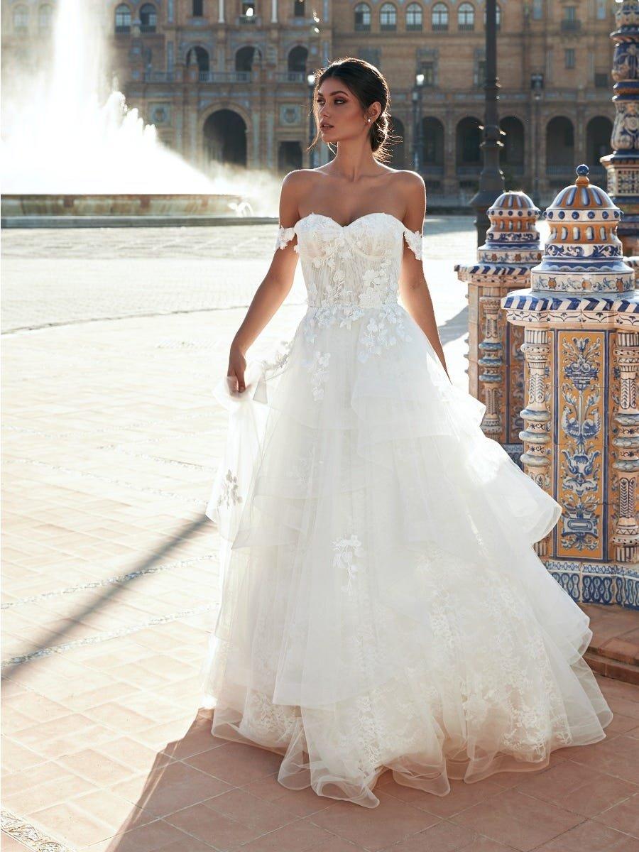 vestido de novia corte princesa con holanes