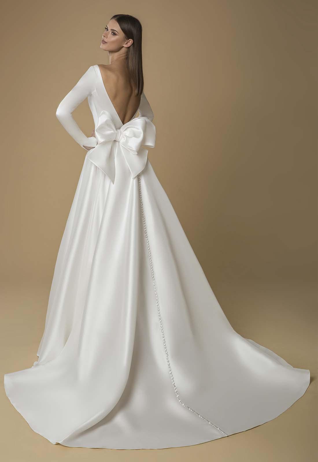 tarjeta papi Detener Estos son los 50 vestidos con moños para novia que no te puedes perder -  bodas.com.mx