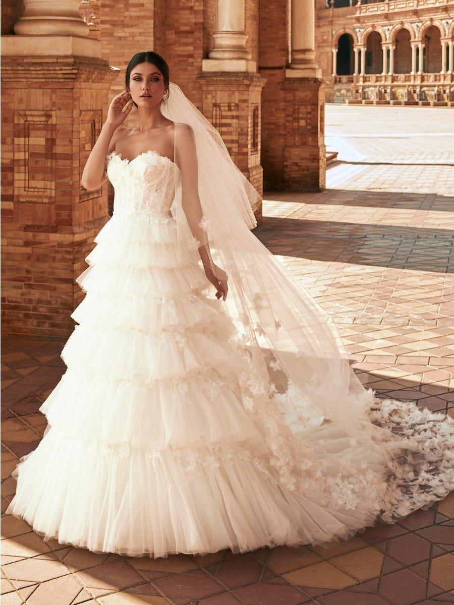 vestido de novia corte princesa con holanes