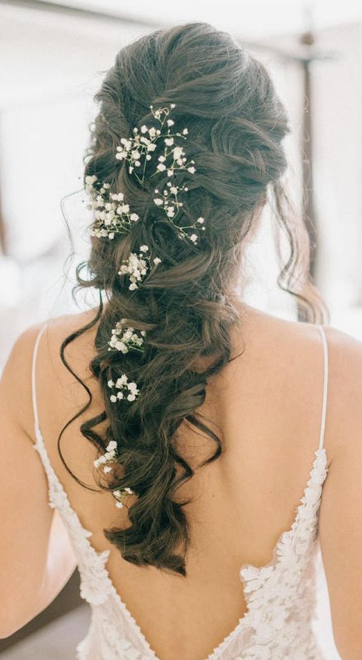 peinados con flores y trenzas