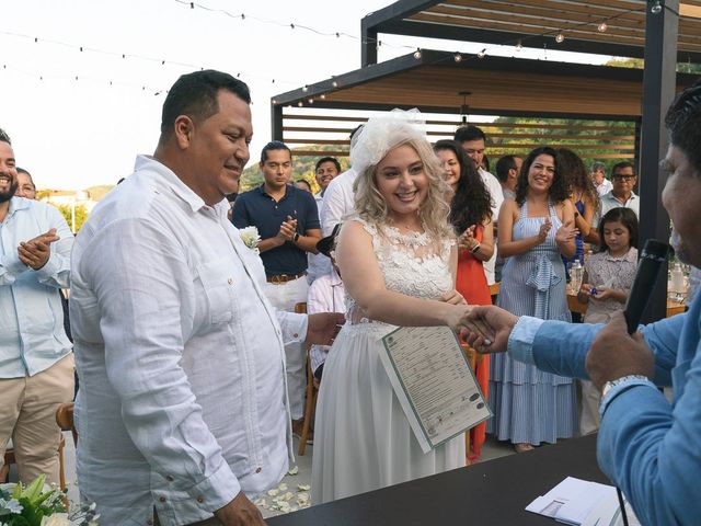 La boda de Eddie y Yunicet en Huatulco, Oaxaca 27