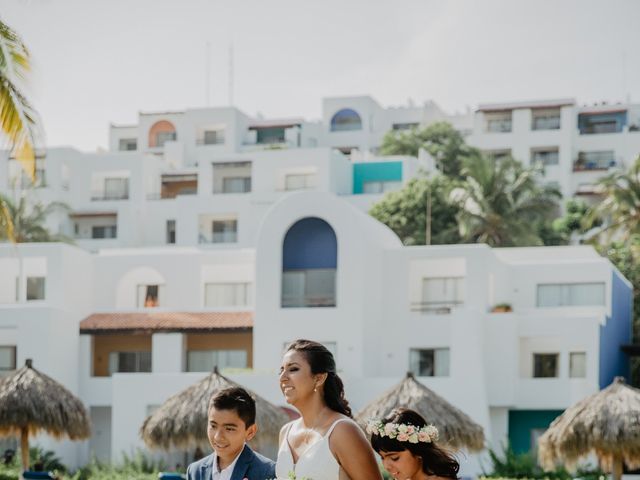 La boda de Mijaíl y Glenda en Huatulco, Oaxaca 18