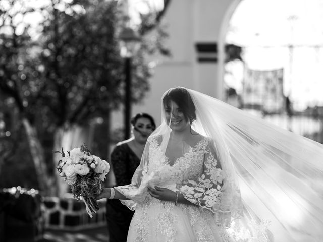 La boda de Mike y Thania en Cholula, Puebla 33