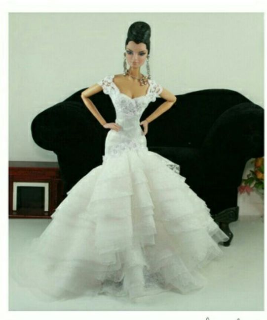 Tu boda:una muñeca vestida  de novia en la mesa principal 8