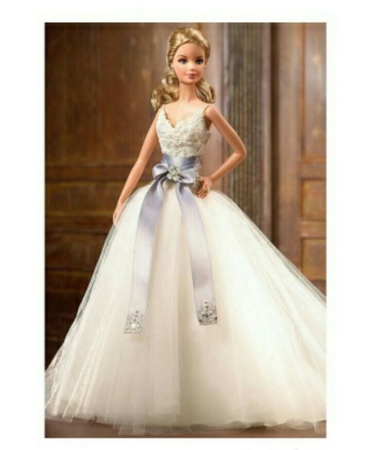 Tu boda:una muñeca vestida  de novia en la mesa principal 10