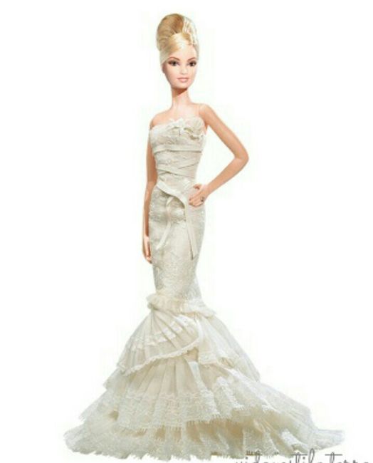 Tu boda:una muñeca vestida  de novia en la mesa principal 12