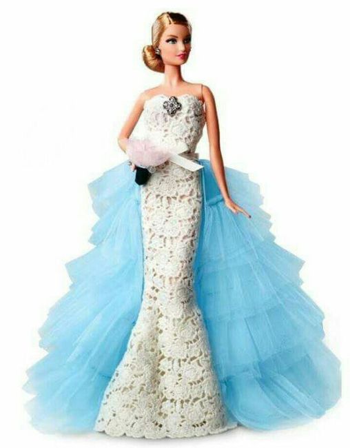 Tu boda:una muñeca vestida  de novia en la mesa principal 14