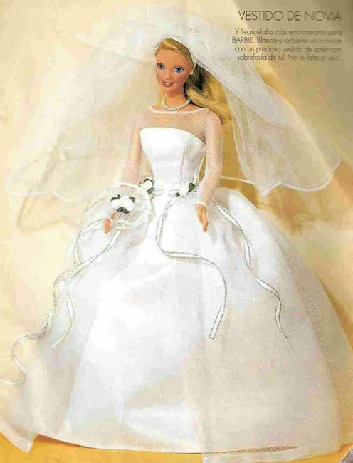 Tu boda:una muñeca vestida  de novia en la mesa principal 17