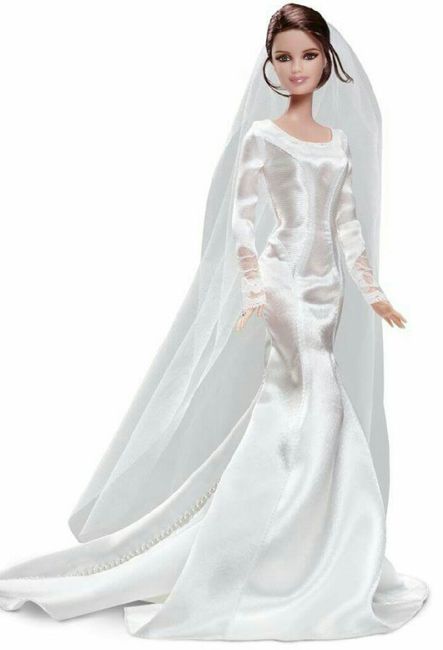 Tu boda:una muñeca vestida  de novia en la mesa principal 23