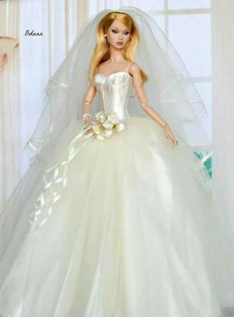 Tu boda:una muñeca vestida  de novia en la mesa principal 27