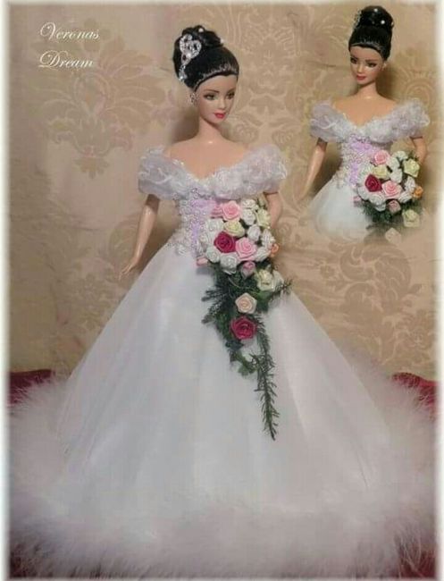 Tu boda:una muñeca vestida  de novia en la mesa principal 28