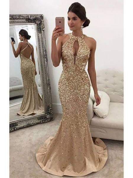 Vestidos en dorado para invitadas 13