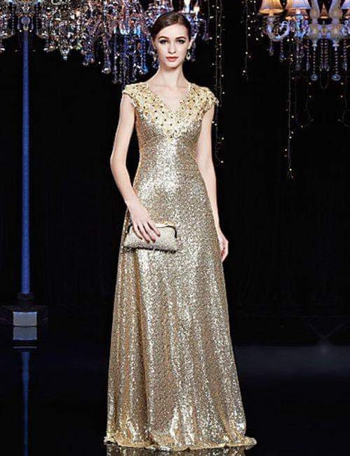 Vestidos en dorado para invitadas 18