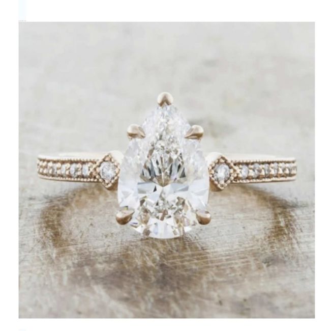 Tendencia 2022:anillos de compromiso de talla tipo pera 13