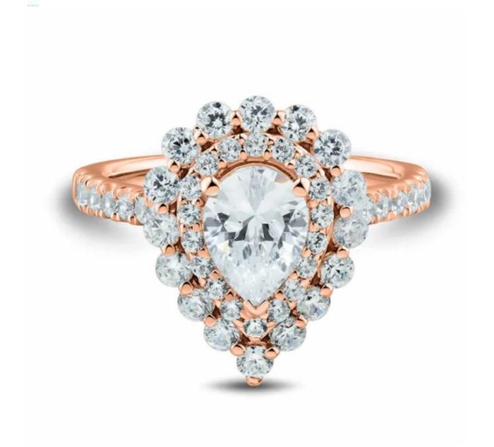 Tendencia 2022:anillos de compromiso de talla tipo pera 15