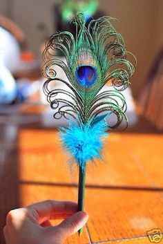 Detalles de boda peacock