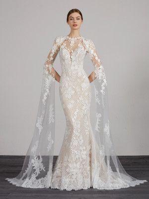 Ponle una bella capa a tu vestido de novia 23