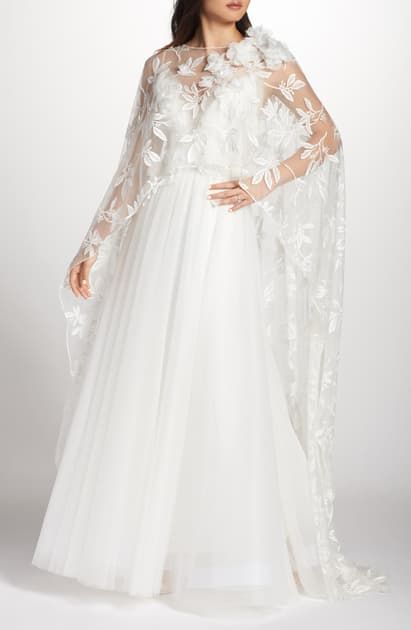 Ponle una bella capa a tu vestido de novia 33