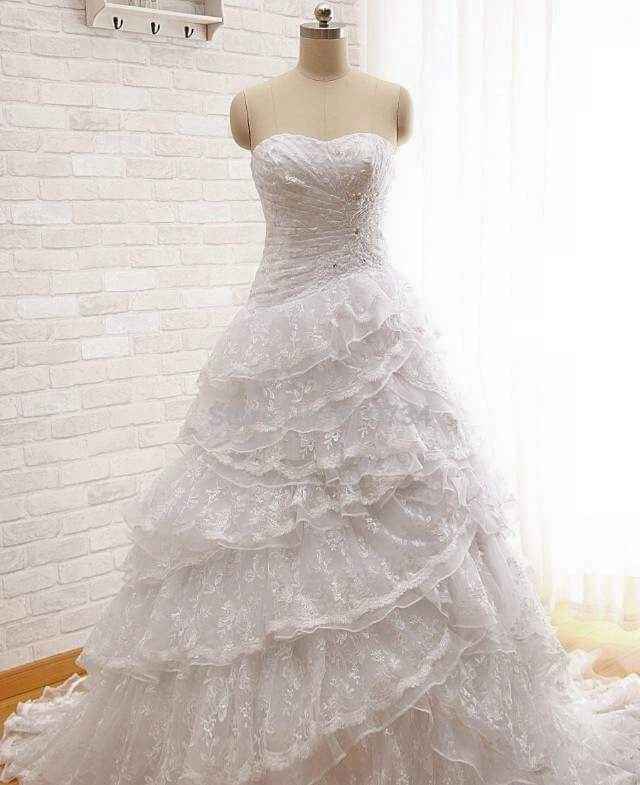 Cómo es su vestido? - 1