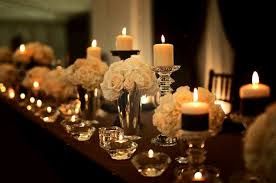 Centro de mesa con más velas que flores 17
