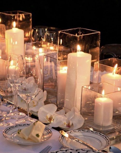 Centro de mesa con más velas que flores 32
