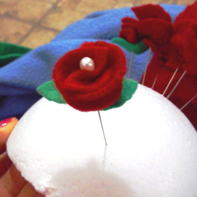 rosas rojas alfileres