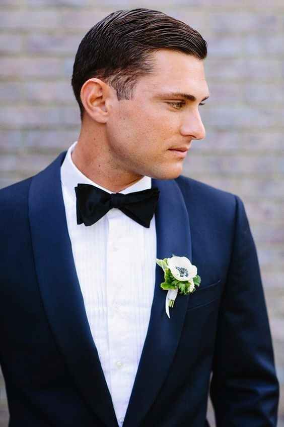 9 Boutonnieres para novios con traje azul