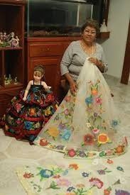 el bordado en tul blanco