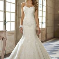 Pienso que en definitiva seria un vestido corte sirena con escote de corazón