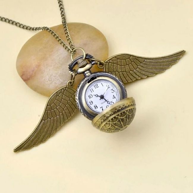 3.Reloj snitch dorada