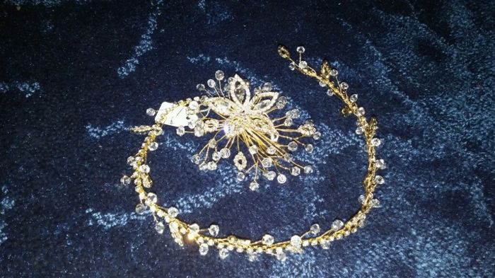 Costo del tocado? - 1