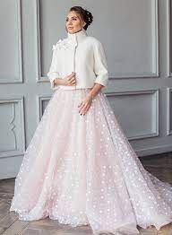 Que recomiendan usar arriba del vestido ya que mi boda será en enero por lo cual siempre hace frio ? 2