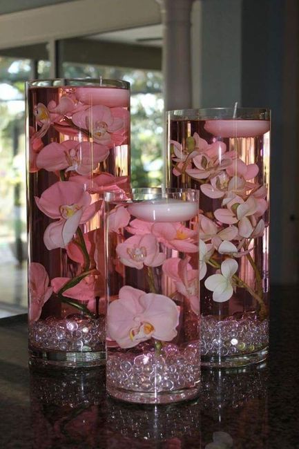 Arreglos de mesa con agua y velas - 11
