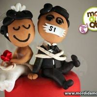 Sabes por qué se usan figuras de novios en el pastel? - 1