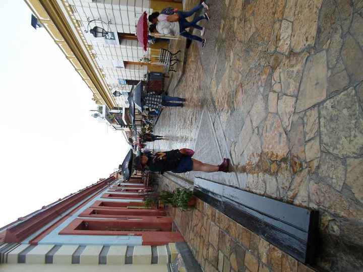 era muy bellooo clima lugar comida gente arte todoo