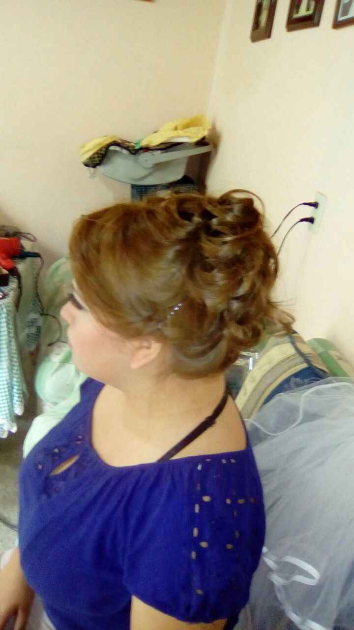 ese va acer mi peinado pero mas alto ya que con mi tocado se necesita muy alto