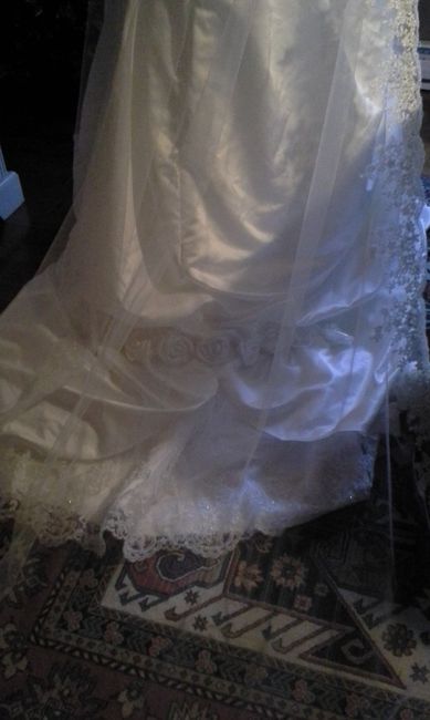 la cola del vestido
