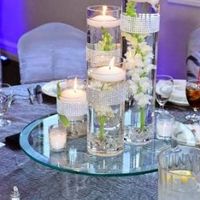Floreros y velas flotantes