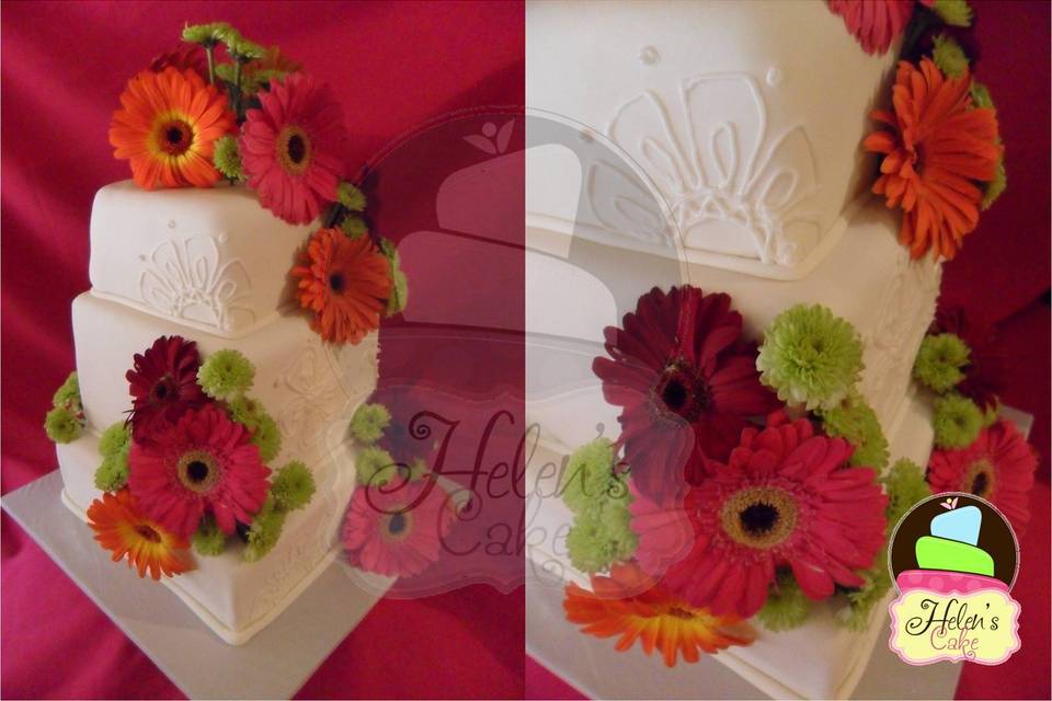 Pastel de fondant con gerberas