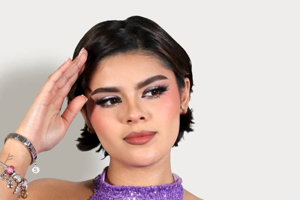 Purple glam makeup look.