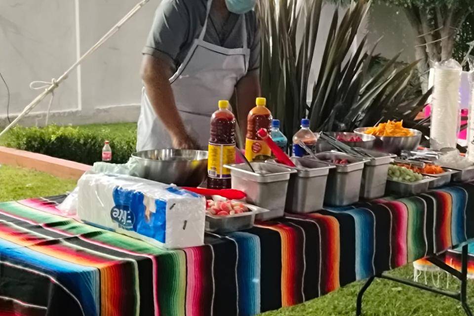 Candy bar y mesa de dulces