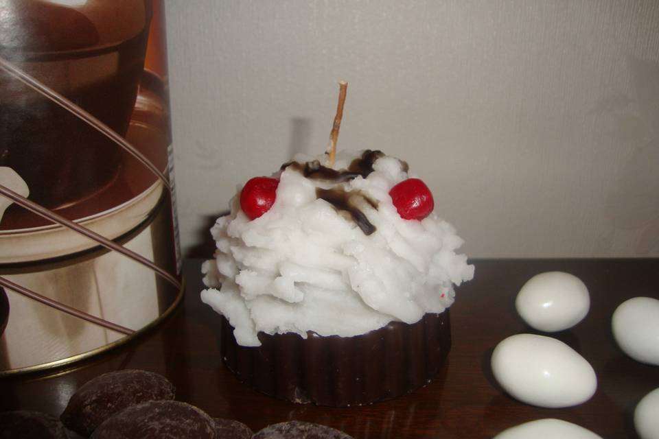 Vela cupcake