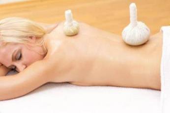 Masajes con compresas calientes