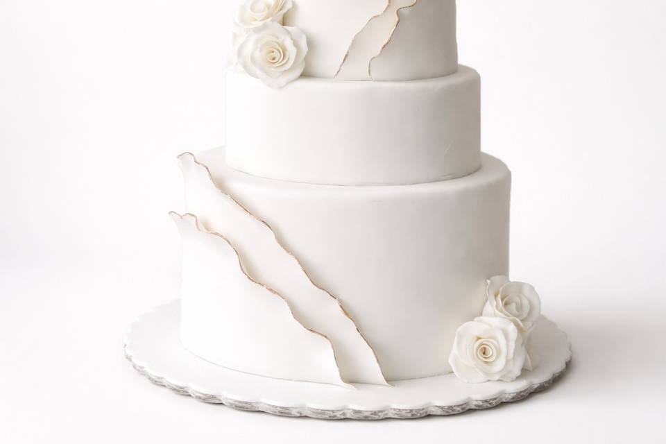Pastel ivory con olanes