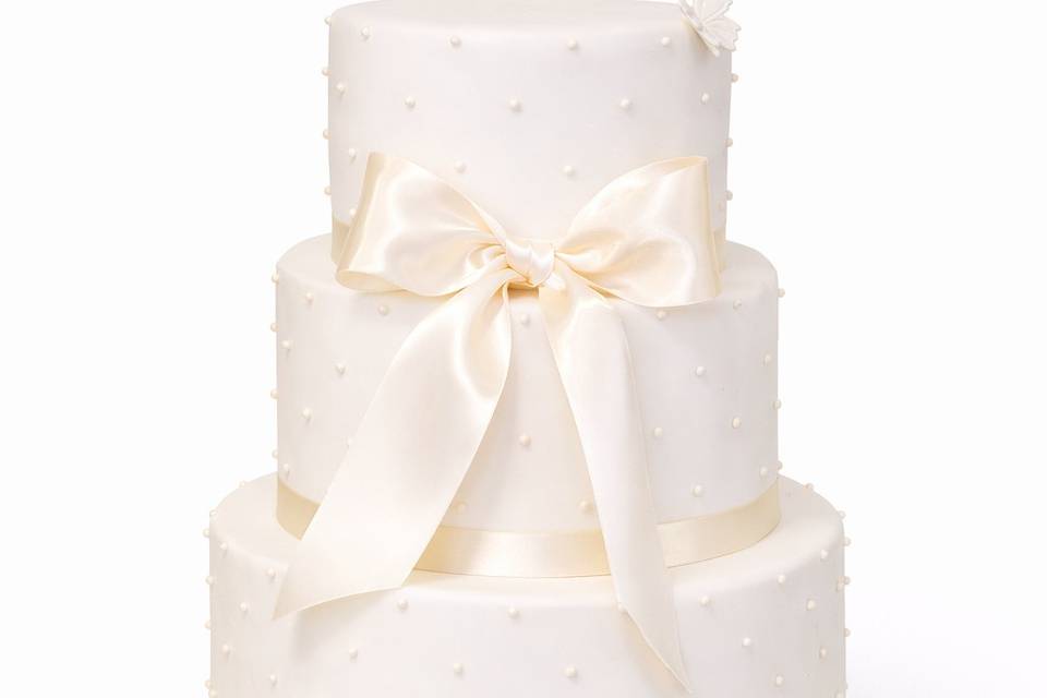 Pastel ivory con moño