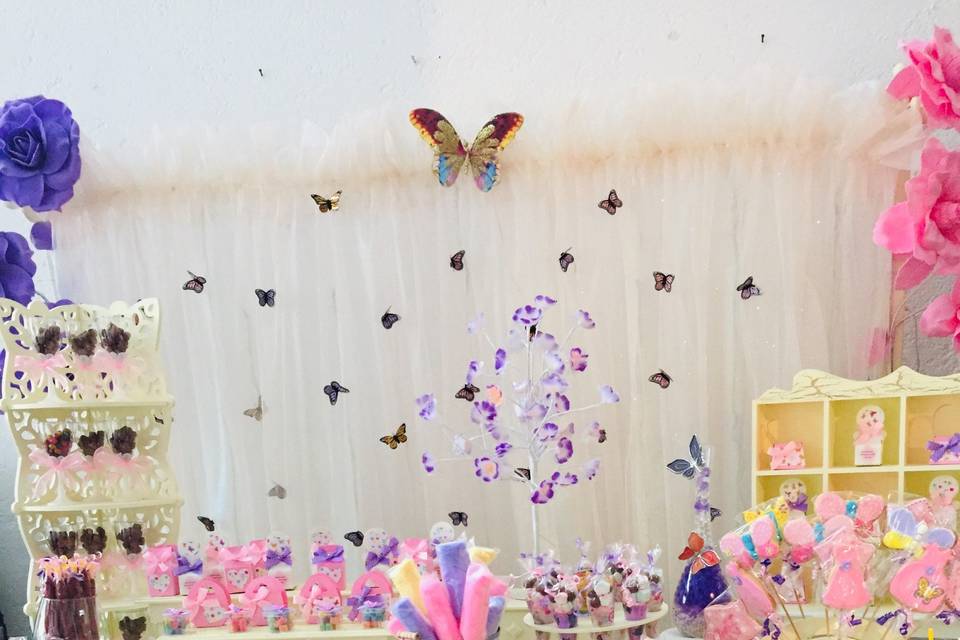 Mesa de dulces mariposa