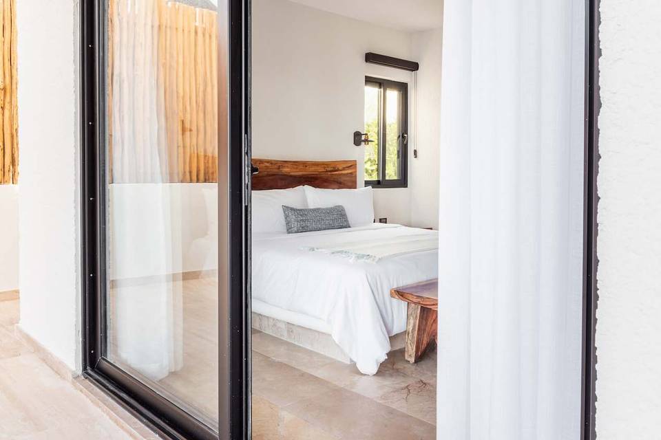 Bedroom with ocean-facing door