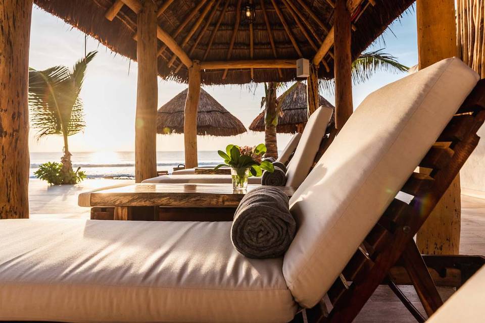 Beachfront palapa lounge chair