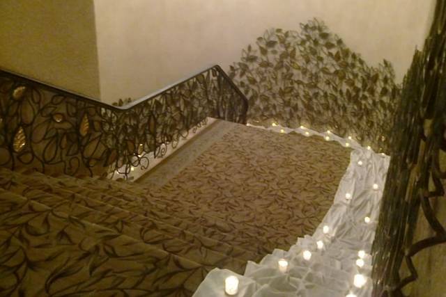 Velitas en las escaleras salón